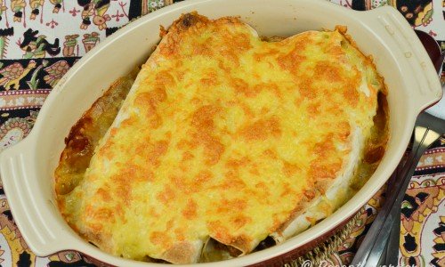 Du kan förbereda burritosarna i formen i god tid innan och ha i kylen. Värm och gratinera med ost till servering. 